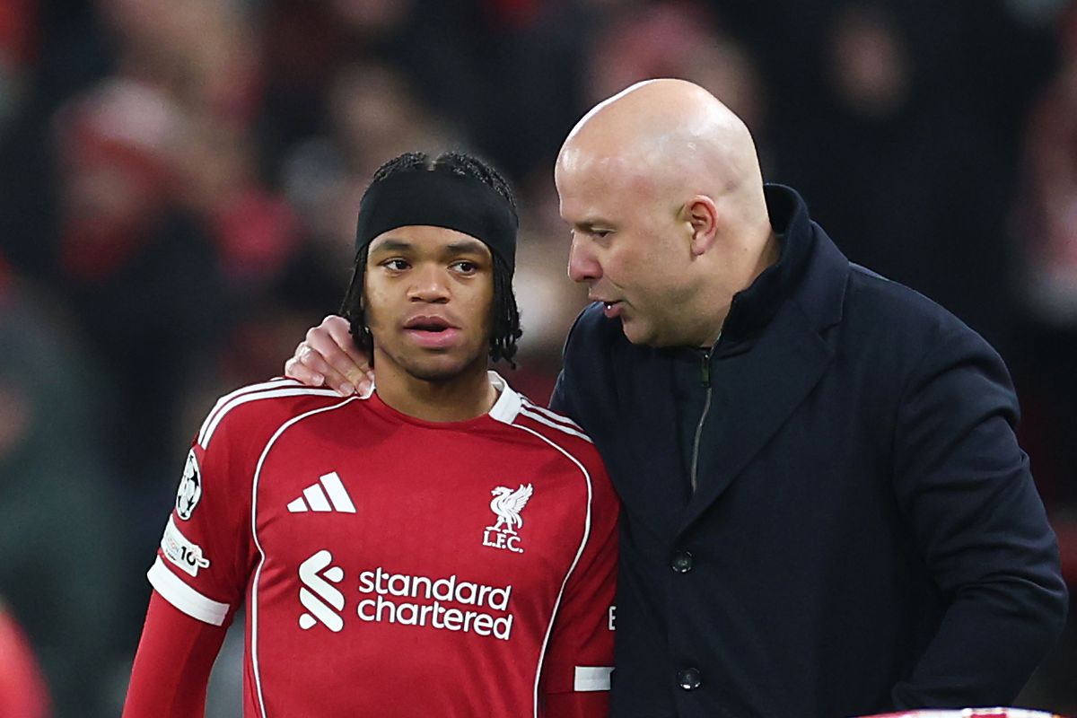 Young Liverpool winger Rio Ngumoha and head coach Arne Slot.
