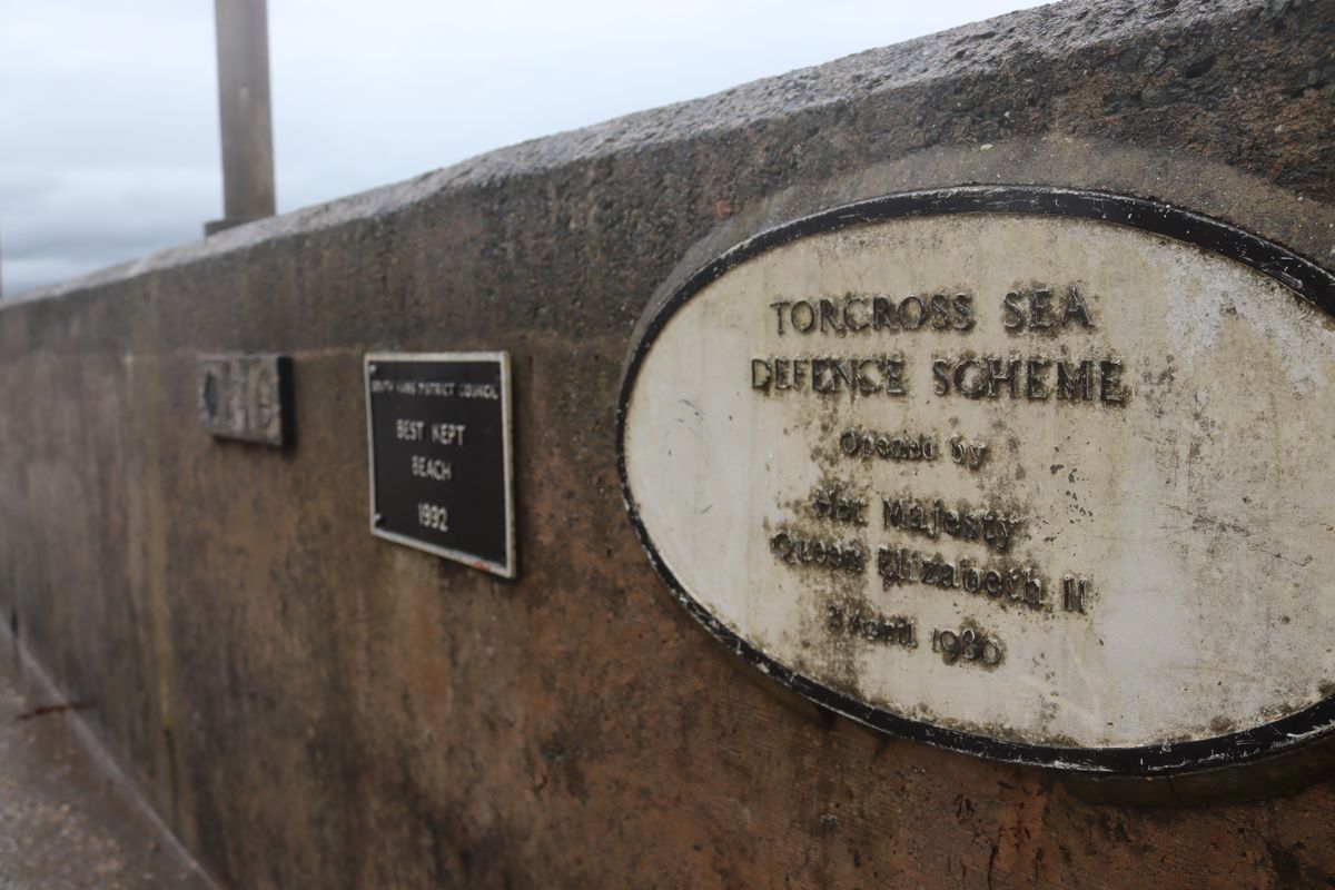 A reminder of previous efforts to protect Torcross from the sea.