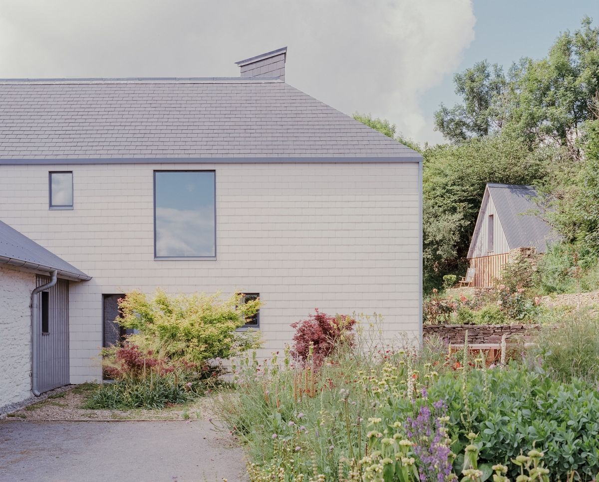 Pretty cottage garden and rear elevation as one of Six projects shortlisted for RSAW Welsh Architecture Awards 2026 - this is Pantybara by Rural Office
