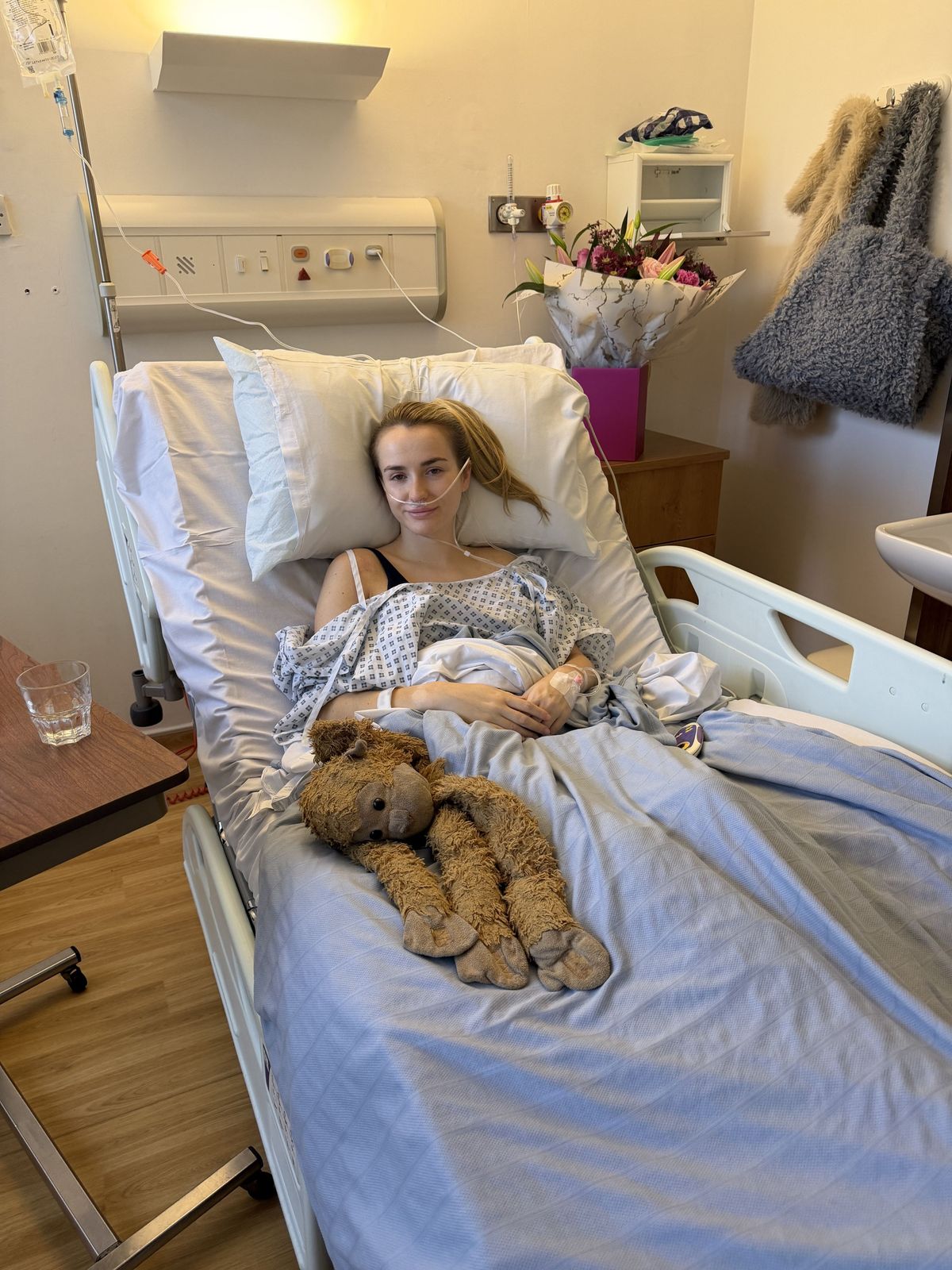 PIC FROM Kennedy News/@lilythompstone (PICTURED: LILY THOMPSTONE, 23, IN HOSPITAL) A woman claims her entire body broke out in a horrific rash due to the STRESS of doctors not taking her illness seriously. Lily Thompstone said she has 'always' suffered with gut issues and was often sick after meals but doctors put it down to IBS and she was continually left in 'discomfort'. Things took a sudden when the 23-year-old woke up with 'humongous' lips in May 2023 and rushed to A&E where she was given steroids to bring down the swelling. DISCLAIMER: While Kennedy News and Media uses its best endeavours to establish the copyright and authenticity of all pictures supplied, it accepts no liability for any damage, loss or legal action caused by the use of images supplied and the publication of images is solely at your discretion. SEE KENNEDY NEWS COPY - 0161 697 4266