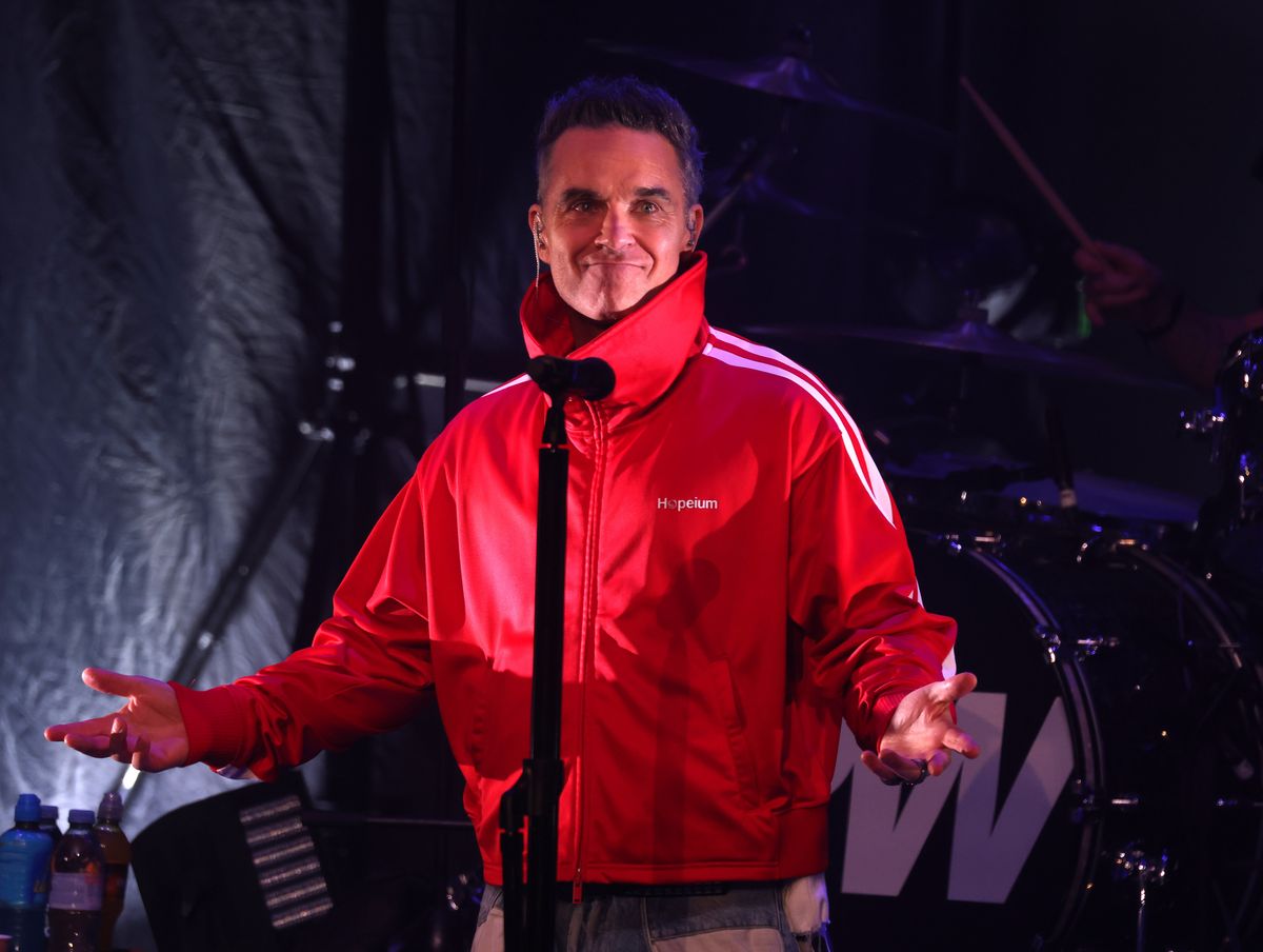 Robbie Williams performs on stage at the Liverpool Olympia 