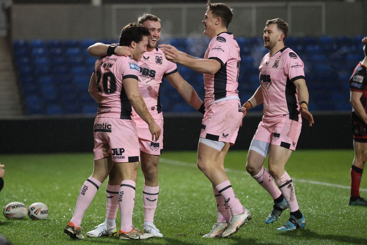 Hull FC celebrate Yusuf Aydin's try.