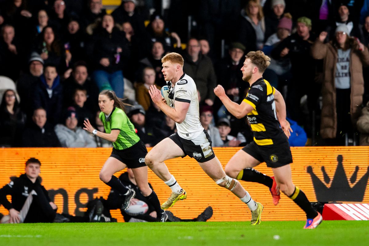 Hull FC's Harvey Barron on his way to a try against York.