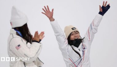 Choi Ga-on celebrates, watched on by Chloe Kim