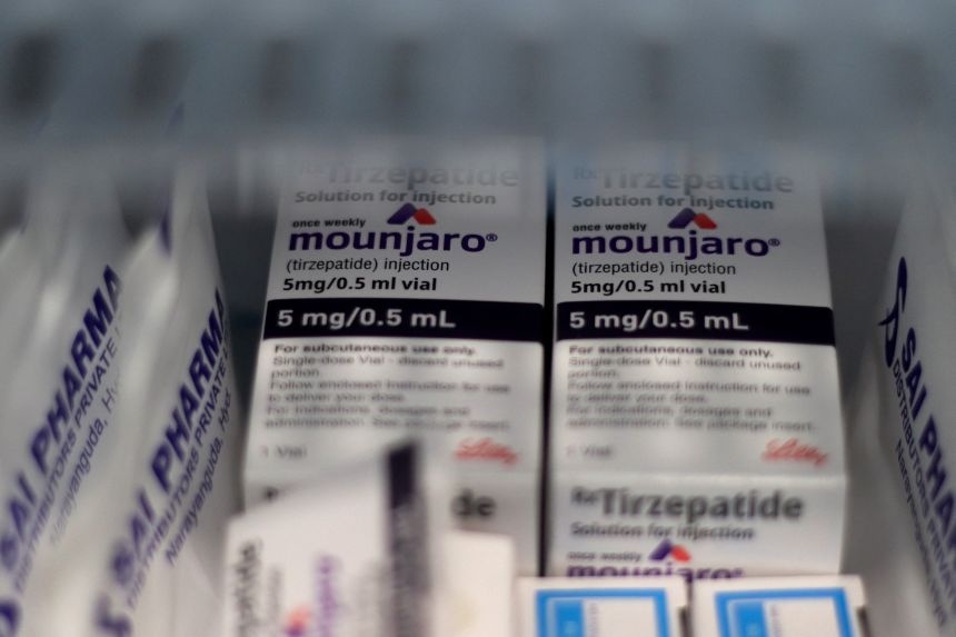 Vials of Mounjaro, a tirzepatide injection drug used for treating type 2 diabetes and weight loss, are seen in a fridge at a health clinic in Hyderabad, India, on April 14, 2025.