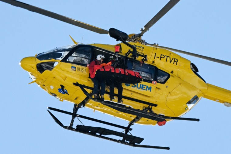 Lindsey Vonn is transported by helicopter after crashing in the women's downhill event in Cortina d'Ampezzo on Feb. 8 2026.