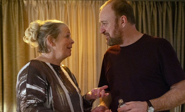 Coronation Street's Bernie Winter-Alahan speaking to Mal and smiling during a night out.