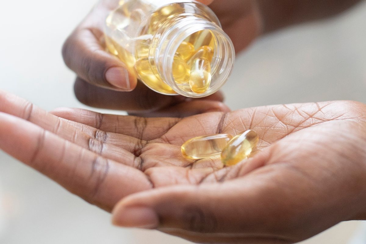 Woman with tablets in hand