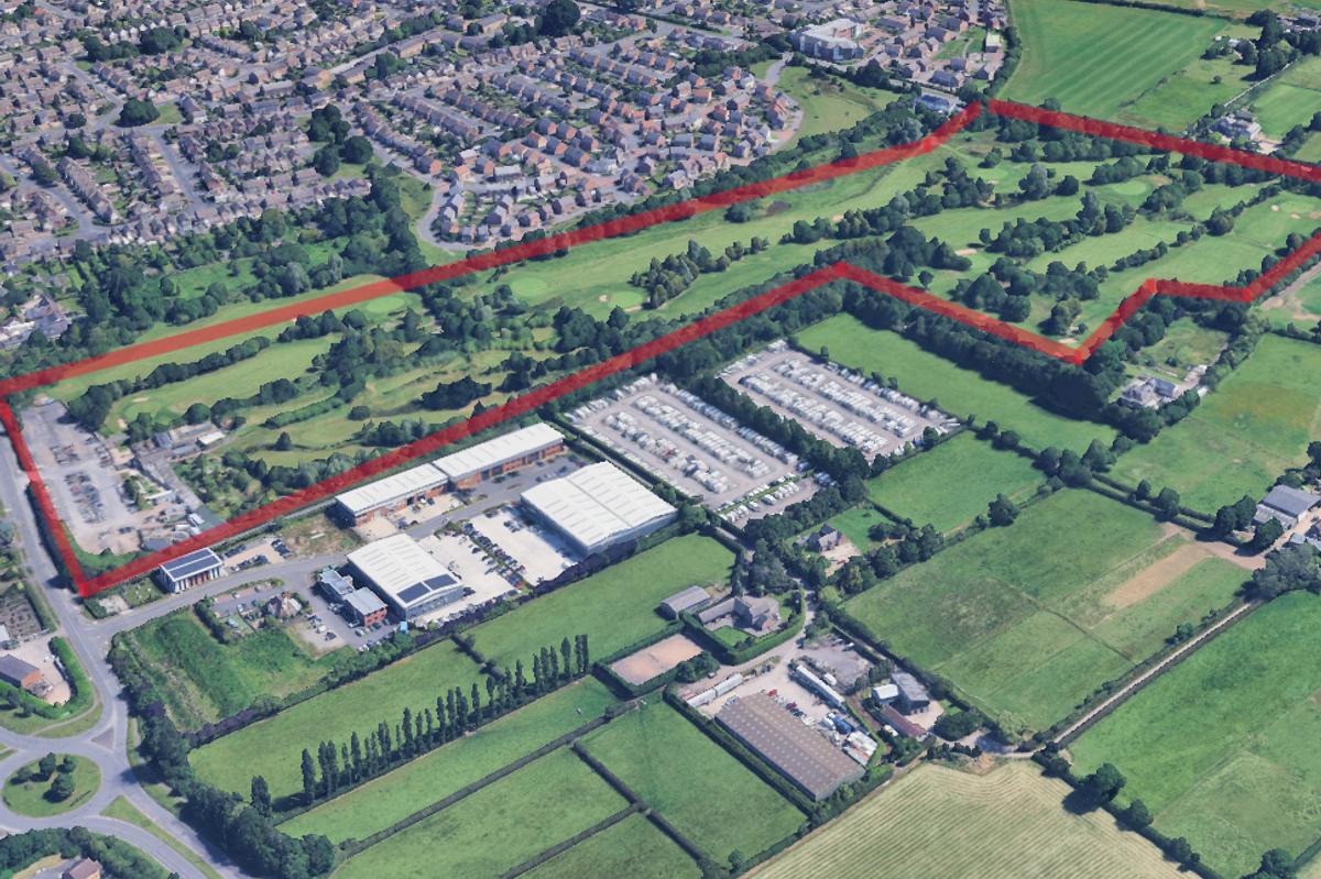Photo shows the site where the homes are planned