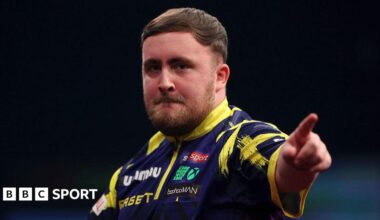 Luke Littler celebrates at the 2026 World Masters