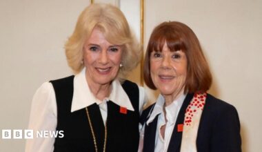 Queen Camilla stood beside Gisèle Pelicot against a pale wall