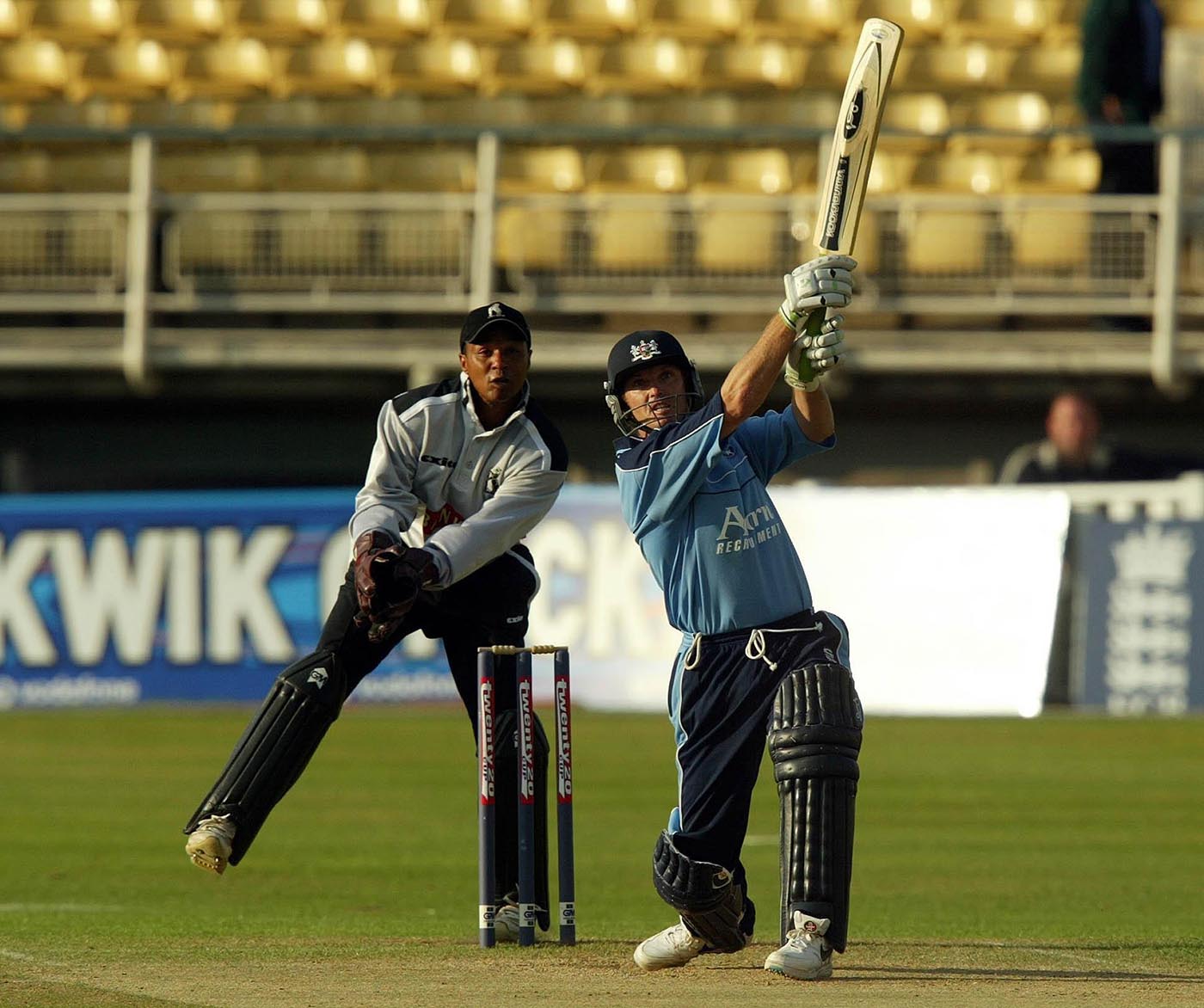 Early achiever: Harvey made the first ever T20 hundred, a round unbeaten 100 off 50 balls, for Gloucestershire in the T20 Cup in 2003