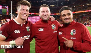 Huw Jones, Finn Russell and Sione Tuipulotu after the Lions' first Test win in Australia