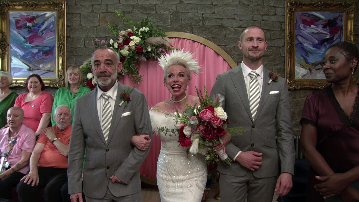 As the wedding gets underway, and Debbie Webster [SUE DEVANEY] performs with the dementia choir, will Carl Webster [JOHNNY HOWARD] and Kevin Webster [MICHAEL LE VELL]  be able to keep their promise or is their feud about to ruin Debbie and Ronnie Bailey’s [VINTA MORGAN] dream day? 