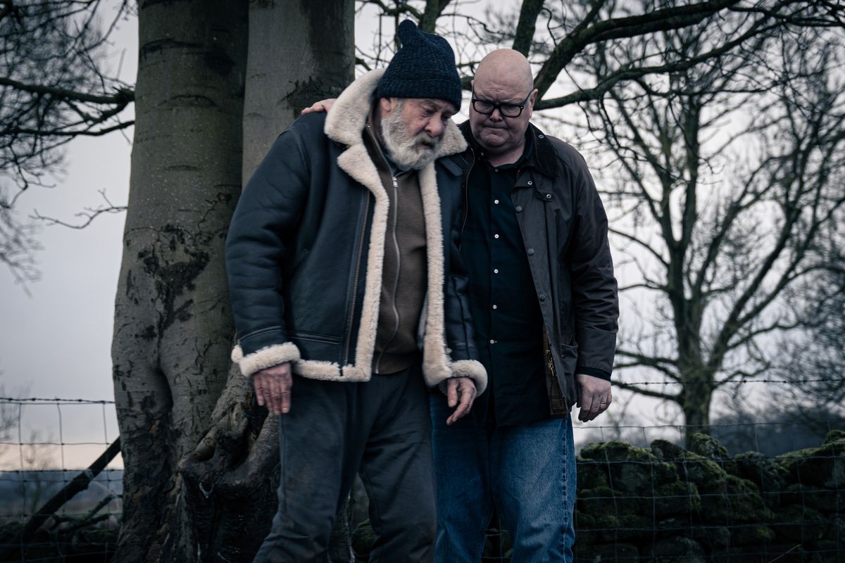 Bear is wandering alone on an isolated country road after leaving the hospital.