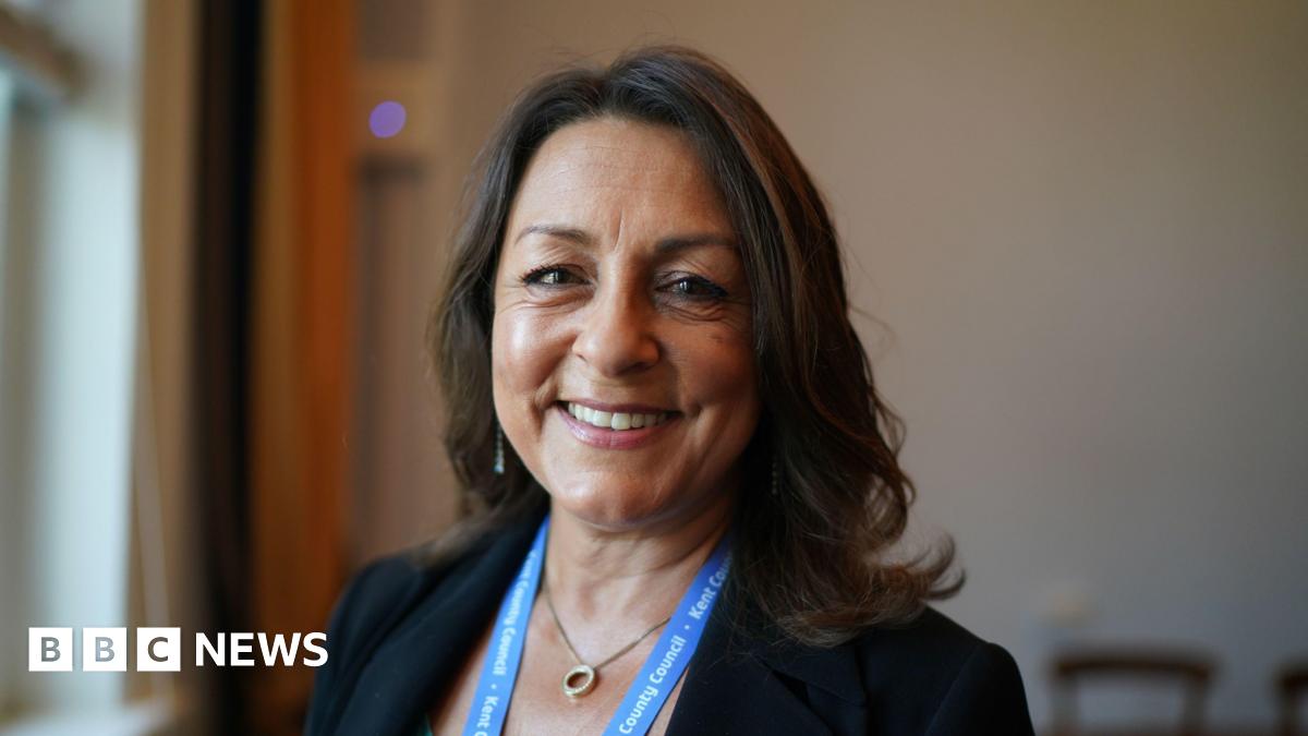 A treated image of a glass beaker with two hearts inside