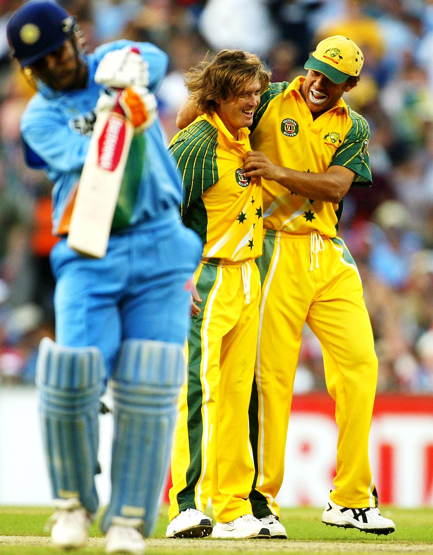 Harvey with pal Andrew Symonds, celebrating a wicket in an ODI against India early in 2004