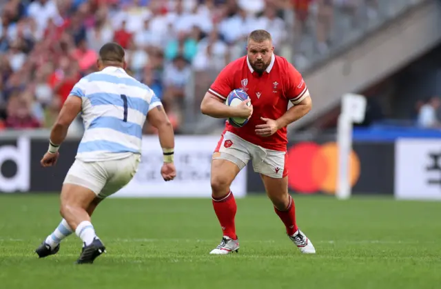 Tomas Francis running with the ball for Wales against Argentina