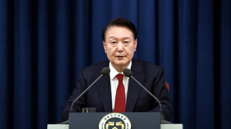 South Korea's president declares martial law – video