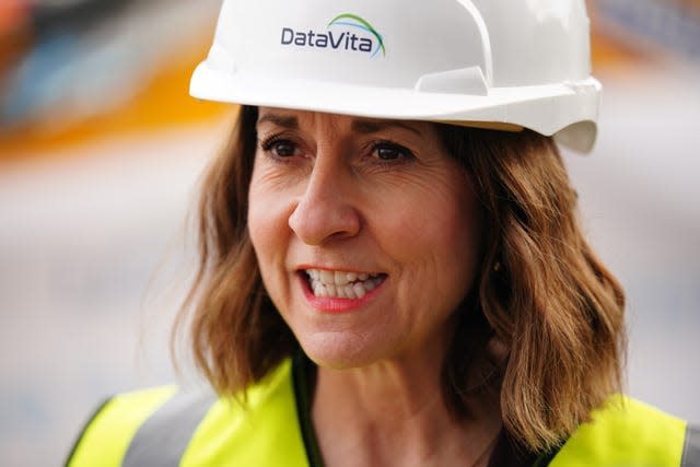 Liz Kendall wearing a hard hat