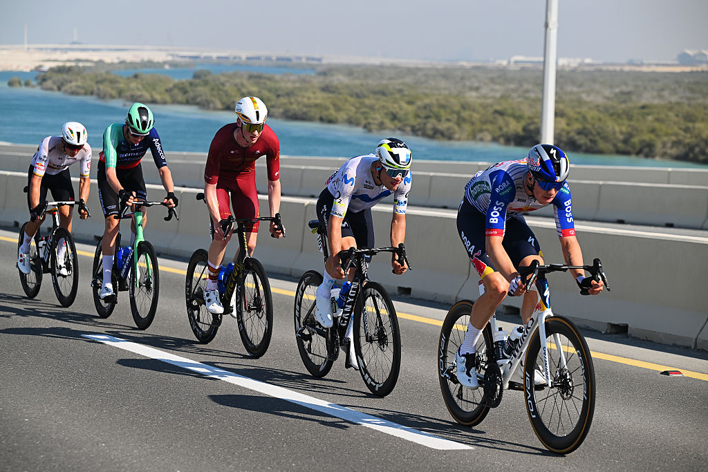ABU DHABI, UNITED ARAB EMIRATES - FEBRUARY 22: A general view of Callum Thornley of Great Britain and Team Red Bull - BORA - hansgrohe, Daan Hoole of Netherlands and Team Decathlon CMA CGM, Ezra Caudell of United States and Team Modern Adventure Pro Cycling, Lorenzo Milesi of Italy and Team Movistar and Aivaras Mikutis of Lithuania and Team Tudor Pro Cycling during the 8th UAE Tour 2026, Stage 7 a 149km stage from Zayed National Museum to Abu Dhabi Breakwater / #UCIWT / on February 22, 2026 in Abu Dhabi, United Arab Emirates. (Photo by Tim de Waele/Getty Images)