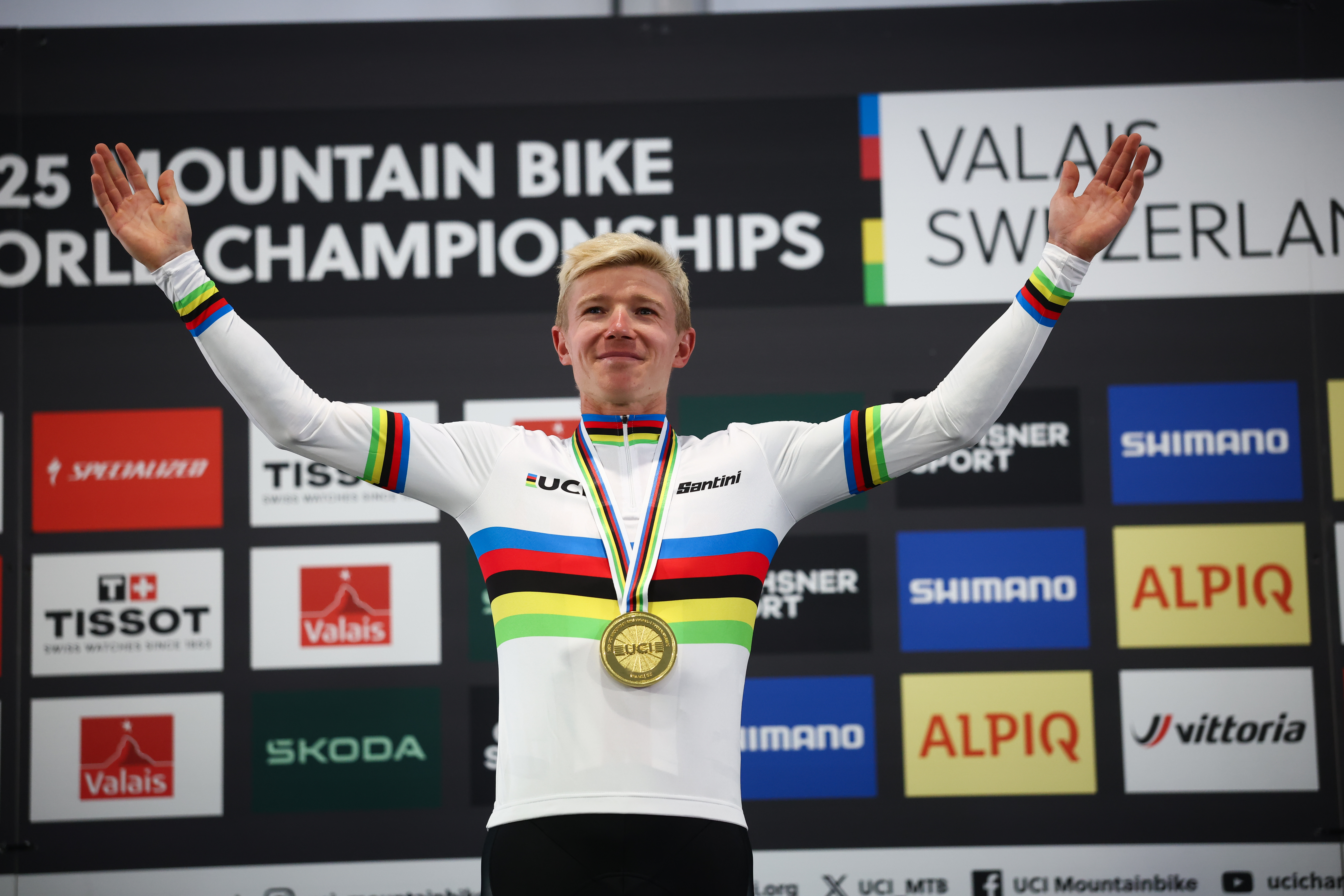 Keegan Swenson in a rainbow jersey