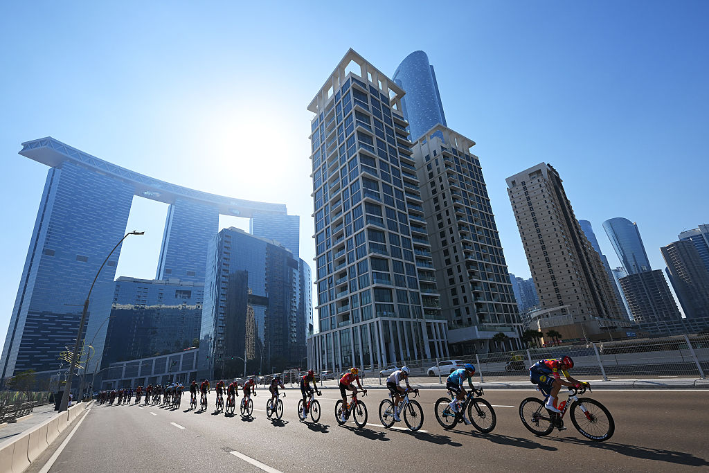 ABU DHABI, UNITED ARAB EMIRATES - FEBRUARY 22: A general view of the peloton passing through a landscape during the 8th UAE Tour 2026, Stage 7 a 149km stage from Zayed National Museum to Abu Dhabi Breakwater / #UCIWT / on February 22, 2026 in Abu Dhabi, United Arab Emirates. (Photo by Tim de Waele/Getty Images)