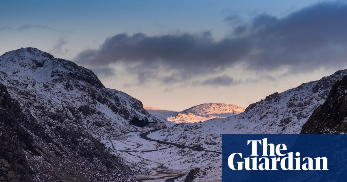 Bodies of two young men found in Eryri mountain range after large-scale search | UK news