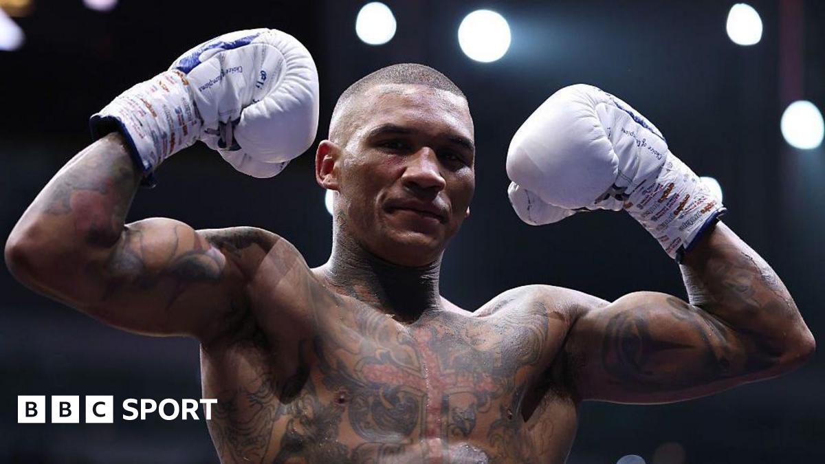 Conor Benn celebrates in the ring