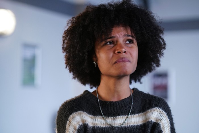 Jasmine cries in a police interview room in EastEnders