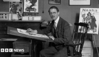 Artist and cartoonist William Heath Robinson (1872 - 1944) at his drawing board.