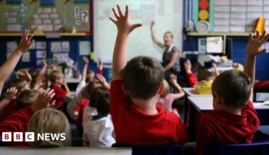 A treated illustration of a car with its headlights on