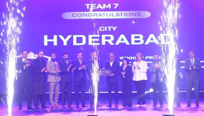 PCB Chairman Mohsin Naqvi and FKS owner Fawad Sarwar (centre) at the auction for the two new PSL teams at the Jinnah Convention Centre in Islamabad on January 8, 2026. — PSL