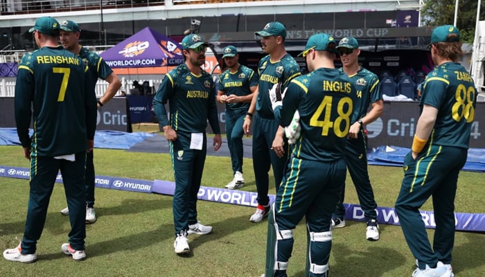 Australia captain Travis Head speaks with team-mates before start of T20 World Cup match against Zimbabwe, Colombo, Sri Lanka, February 13, 2026. — ICC