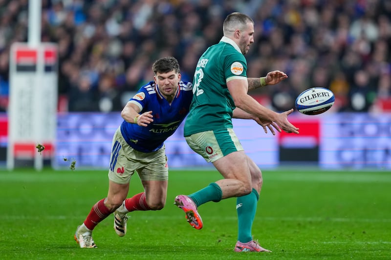 Stuart McCloskey of Ireland is tackled by Matthieu Jalibert of France during the Six Nations 2026 match in Paris. Photograph: Franco Arland/Getty Images