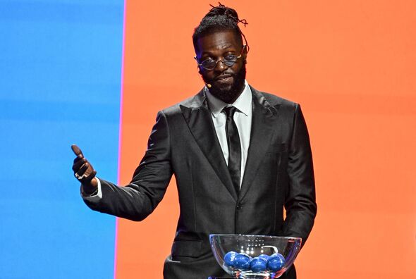 Former Togolese football player Emmanuel Adebayor attends the qualifying draw for the Africa zone of the 2026 FIFA World Cup, in Abidjan on July 13, 2023. (Photo by Issouf SANOGO / AFP) (Photo by ISSOUF SANOGO/AFP via Getty Images)