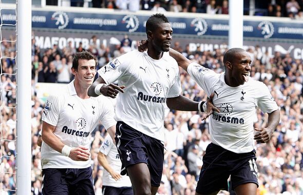 Emmanuel Adebayor celebrates scoring for Tottenham.