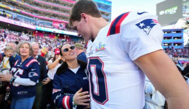 New England Patriots quarterback Drake Maye (10) hugs his wife Ann Michael before the NFL Super Bowl 60 football game against the Seattle Seahawks, Sunday, in Santa Clara, Calif.