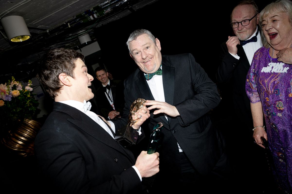 LONDON, ENGLAND - FEBRUARY 22: Robert Aramayo and John Davidson backstage during the EE BAFTA Film Awards 2026 at The Royal Festival Hall on February 22, 2026 in London, England. (Photo by Carlo Paloni/BAFTA via Getty Images)