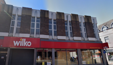 Shutters down on a Wilko's store with blue sky above