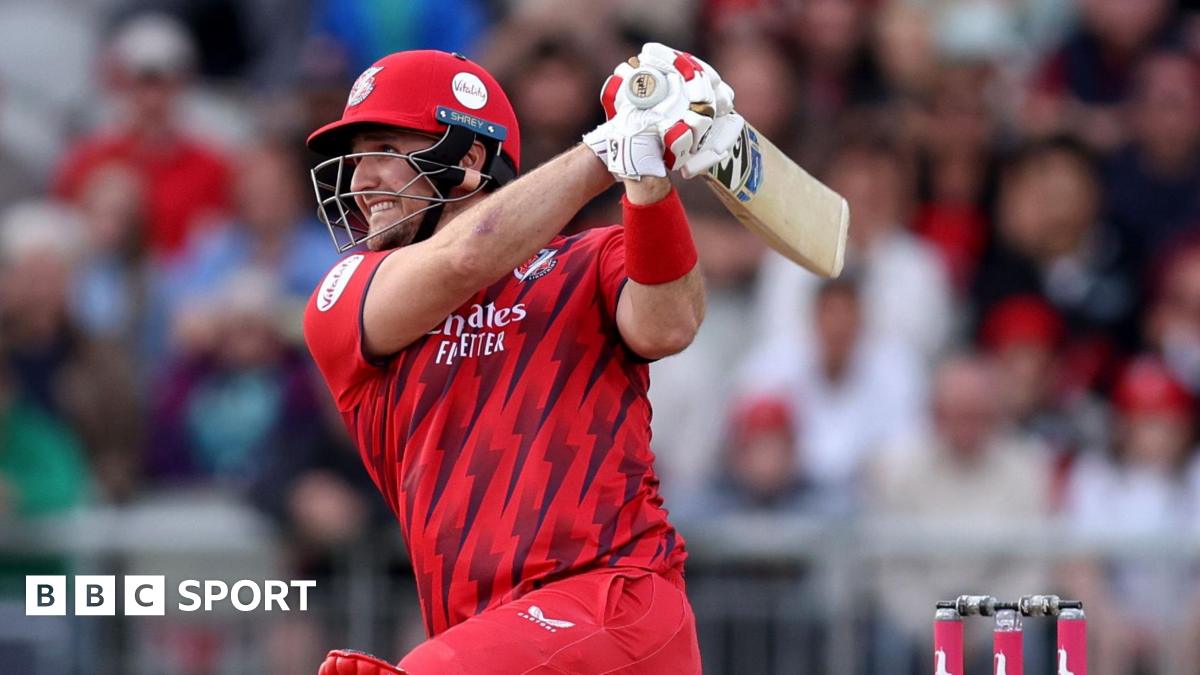 Liam Livingstone playing for Lancashire, hitting a shot down on one knee with his bat over his shoulder in the follow-through