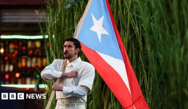 Bad Bunny performs with Puerto Rico's flag during the halftime in the Apple Music Halftime Show during the Super Bowl halftime at Levi's Stadium in Santa Clara, California. Photo: 8 February 2026