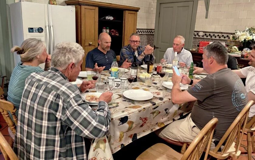Celtic Dagger team members planning around the dinner table