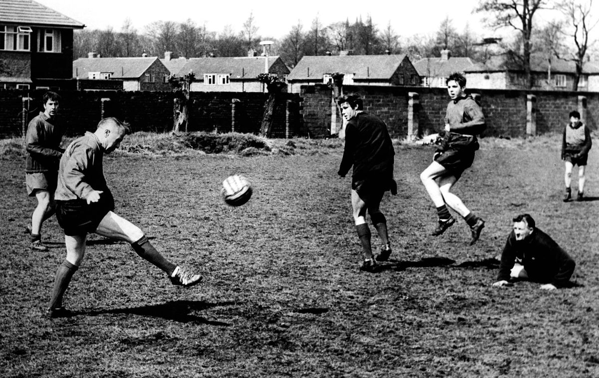 Bill Shankly has a shot at Bob Paisley (floor) at Melwood