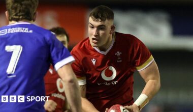 Luke Evans carries the ball for Wales Under-20s against France