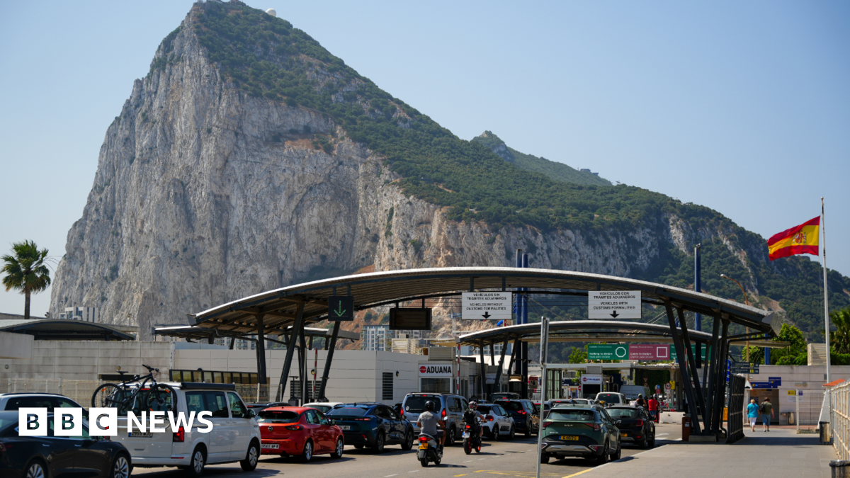 Cars queue at the border between Spain and the Rock of Gibraltar