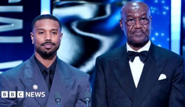 A photo from the film of the actor on the balcony of a high flat looking out