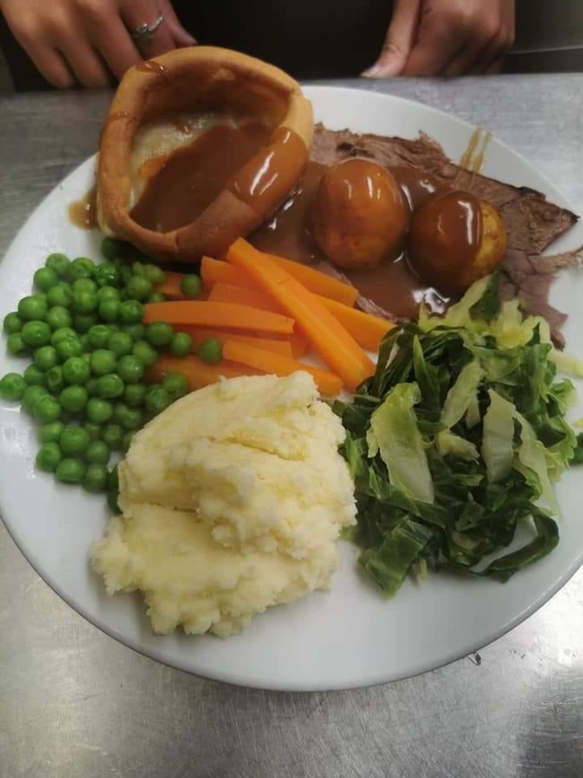 Plate full with roast dinner