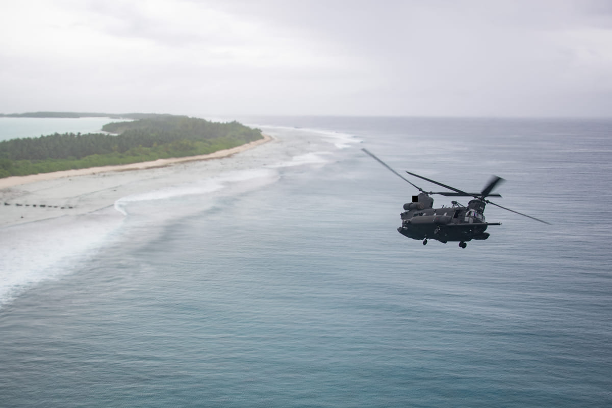 A MH-47G Chinook, attached to the “Night Stalkers” of US Army 160th Special Operations Aviation Regiment, flies over Diego Garcia in British Indian Ocean Territory (Samantha Jetzer/US Navy photo)