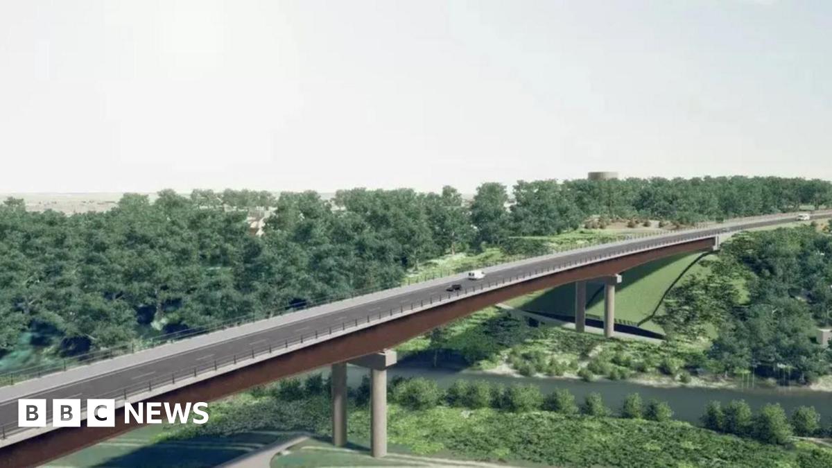 A drawing of a planned road bridge over green fields and trees with a river running below it